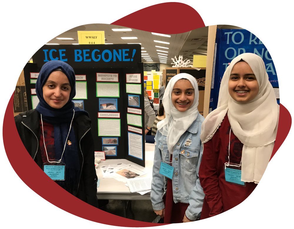 Science Fair Exhibitors with their Project Board